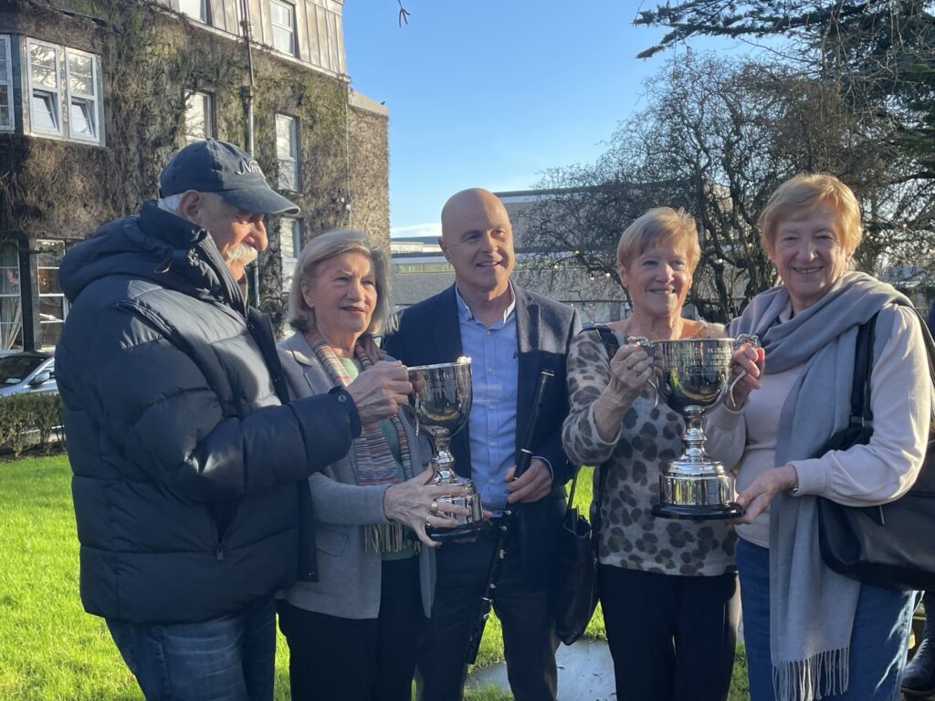 The deRegge family presenting the Ernest deRegge RIP trophies to Garry Shannon, Clare Comhaltas County Chairman 